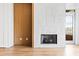 Stylish fireplace next to door leading to outside at 510 Glenwood Ave # 602, Raleigh, NC 27603