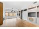 Bright living room with hardwood floors, large window and fireplace at 510 Glenwood Ave # 602, Raleigh, NC 27603