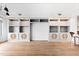 Bright living room featuring hardwood floors, built-in shelves and good light at 510 Glenwood Ave # 602, Raleigh, NC 27603