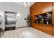 Lobby featuring elevator, seating area, wood paneled walls, and decorative lighting at 510 Glenwood Ave # 602, Raleigh, NC 27603