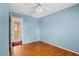 Bedroom featuring hardwood floors and neutral colored walls at 5401 Kaplan Dr, Raleigh, NC 27606