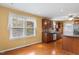 Eat-in kitchen with stainless steel appliances and ample cabinet space at 5401 Kaplan Dr, Raleigh, NC 27606