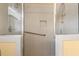 Shower with tile surround, glass door, and shower head fixtures at 5401 Kaplan Dr, Raleigh, NC 27606