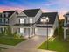 Charming two-story home with landscaped yard, covered porch and a two-car garage at 6 S Summerhill Rdg, Clayton, NC 27520