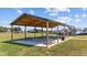 Covered picnic area with picnic tables, offering a great space for outdoor gatherings at 6 S Summerhill Rdg, Clayton, NC 27520