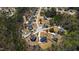 High-angle view of a neighborhood showcasing modern homes with private driveways and meticulously manicured lawns at 609 Meyers Place Ln, Holly Springs, NC 27540