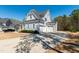Long driveway and three-car garage at 609 Meyers Place Ln, Holly Springs, NC 27540
