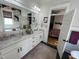 Spacious bathroom featuring double sinks, marble countertops, and stylish decor at 65 Oglethorpe Ave, Clayton, NC 27527