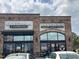 Exterior view of Hershey's Ice Cream and Hwy 42 Cafe with modern glass fronts and classic brick facades at 65 Oglethorpe Ave, Clayton, NC 27527