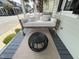 Relaxing front porch with swing, pillows, and a decorative table at 65 Oglethorpe Ave, Clayton, NC 27527