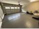 Clean and spacious three-car garage with epoxy flooring at 65 Oglethorpe Ave, Clayton, NC 27527