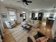 Spacious living room with hardwood floors, ample seating, and natural light at 65 Oglethorpe Ave, Clayton, NC 27527