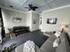 Inviting porch area featuring a cozy seating area and adjacent dining space at 65 Oglethorpe Ave, Clayton, NC 27527