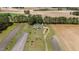 An aerial shot reveals this charming home nestled among expansive farmland and lush greenery at 664 Marler Rd, Benson, NC 27504