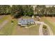 Aerial view of the home, surrounded by trees and expansive outdoor space at 664 Marler Rd, Benson, NC 27504
