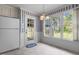 Eat-in dining area with beadboard and chair rail, and large picture windows at 664 Marler Rd, Benson, NC 27504