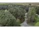 Overhead view of home nestled within a forest, highlighting its peaceful and secluded location at 707 Sinai Cir, Hillsborough, NC 27278