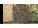 Aerial view of property showcasing the expansive lot with wooded boundaries and established landscaping at 711 Kentcie Ln, Efland, NC 27243