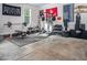 Fully equipped home gym with weightlifting equipment, punching bag, and ample space for workouts at 711 Kentcie Ln, Efland, NC 27243