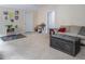 Cozy living room with neutral carpet, ample natural light, and stylish decor at 711 Kentcie Ln, Efland, NC 27243