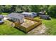 An aerial showing the full backyard, with a new fence and the home's exterior at 815 Goshen St, Oxford, NC 27565