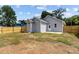 Spacious backyard with wooden fence and a concrete patio at 815 Goshen St, Oxford, NC 27565
