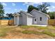 Spacious backyard with wooden fence and a concrete patio at 815 Goshen St, Oxford, NC 27565