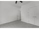 This bedroom is a blank canvas with neutral carpet, ceiling fan, and closet at 815 Goshen St, Oxford, NC 27565