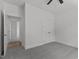 Bright bedroom with carpet, ceiling fan, and a closet offers a comfortable space at 815 Goshen St, Oxford, NC 27565