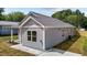 Exterior shot featuring a new build with gray siding, white trim, and modern windows at 815 Goshen St, Oxford, NC 27565