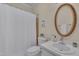 Bright bathroom with a shower/tub, and a vanity with sink, offering essential amenities at 8325 Wycombe Ln, Raleigh, NC 27615