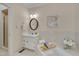 Well-lit bathroom features a tub, shower, vanity with sink, and modern fixtures at 8325 Wycombe Ln, Raleigh, NC 27615