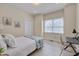 Cozy bedroom featuring a comfy bed, bright natural light, and dedicated desk area at 8325 Wycombe Ln, Raleigh, NC 27615