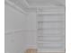 Walk-in closet featuring built-in shelving for optimal storage at 8325 Wycombe Ln, Raleigh, NC 27615