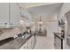 Well-equipped kitchen with stone countertops and stainless steel appliances at 8325 Wycombe Ln, Raleigh, NC 27615