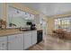 This kitchen features ample counter space, modern appliances, and a view to other rooms at 85 Rolling Cloud Dr, Louisburg, NC 27549