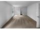 Large bedroom with plush carpet and a doorway leading to another room at 932 Mailwood Dr, Knightdale, NC 27545