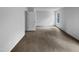 Spacious bedroom featuring plush carpeting and a window for natural light at 932 Mailwood Dr, Knightdale, NC 27545