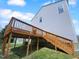 Exterior view of a spacious wooden deck, perfect for outdoor entertaining and relaxation at 932 Mailwood Dr, Knightdale, NC 27545