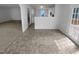 Open dining area connects the kitchen and living spaces, with an easy access to a backyard deck at 932 Mailwood Dr, Knightdale, NC 27545