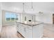 Kitchen with center island, granite counters, pendant lighting, and stainless steel appliances at 9744 Bear Run Ln, Middlesex, NC 27557
