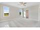 Spacious bedroom with neutral walls, carpet flooring, natural light, and a walk-in closet at 9744 Bear Run Ln, Middlesex, NC 27557
