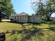 Spacious backyard providing ample green space and outdoor potential at 1004 Fuller St, Smithfield, NC 27577