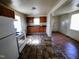 A kitchen that has cabinets, a sink, and an oven/stove range at 1004 Fuller St, Smithfield, NC 27577