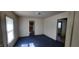 Open living room, with doorways leading to adjacent rooms at 1004 Fuller St, Smithfield, NC 27577