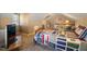 Sunlit bedroom with a cozy bed, comfortable seating area, and a soothing ambiance at 1005 Brookview Dr, Elon, NC 27244