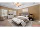 Bright bedroom featuring natural light, neutral decor, and ample space for relaxation at 1005 Brookview Dr, Elon, NC 27244