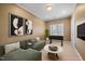 Game room with sleek seating, neutral decor, and a foosball table at 1005 Brookview Dr, Elon, NC 27244