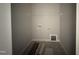 Utility room featuring stylish patterned flooring and space for laundry appliances at 102 Ruskin Dr, Smithfield, NC 27577