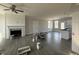 Spacious living room featuring a fireplace with gray flooring, awaiting your personal touches at 102 Ruskin Dr, Smithfield, NC 27577